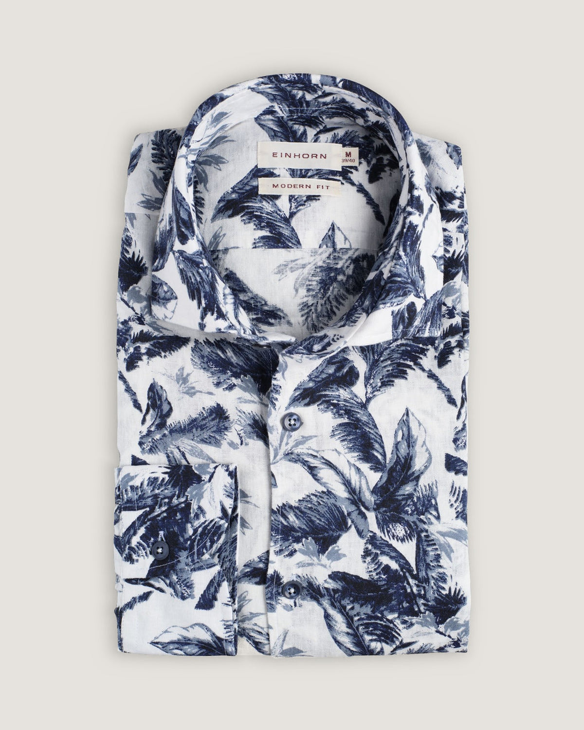 Das Einhorn Hemd Modern Fit Palmendruck Blau ist ein Ausdruck moderner Lässigkeit mit natürlichem Stilgefühl.