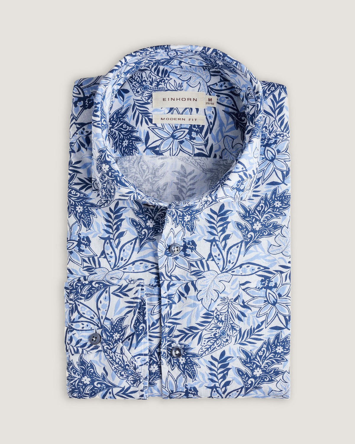 Das Einhorn Leinenbaumwollhemd mit floralem Print Modern Fit Blau vereint sommerliche Leichtigkeit mit eleganter Musterung.